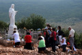 enjosmith, Prayers at Medjugorje, CC BY-NC-SA 2.0, flickr